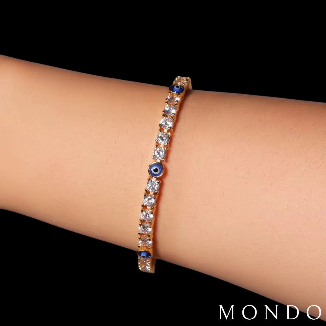 צמיד טניס עין כחולה - זהב 18 קראט